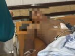 Petugas kepolisian menangani lokasi dugaan penembakan terhadap dua warga di kawasan Seberang Ulu I, Palembang.
